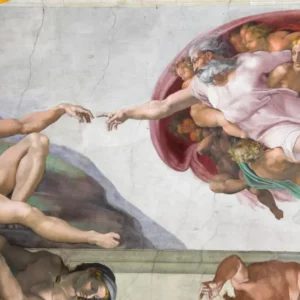 Michelangelo's 'The Creation of Adam' with God and Adam's fingers nearly touching on the Sistine Chapel ceiling